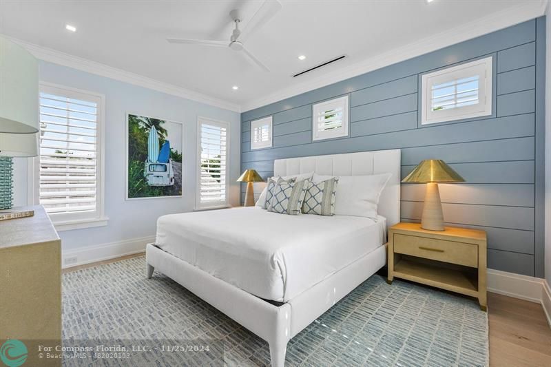 1122 Miramar Drive Delray Beach, FL 33483 - Photo 26 of 44 a bedroom with a bed and window