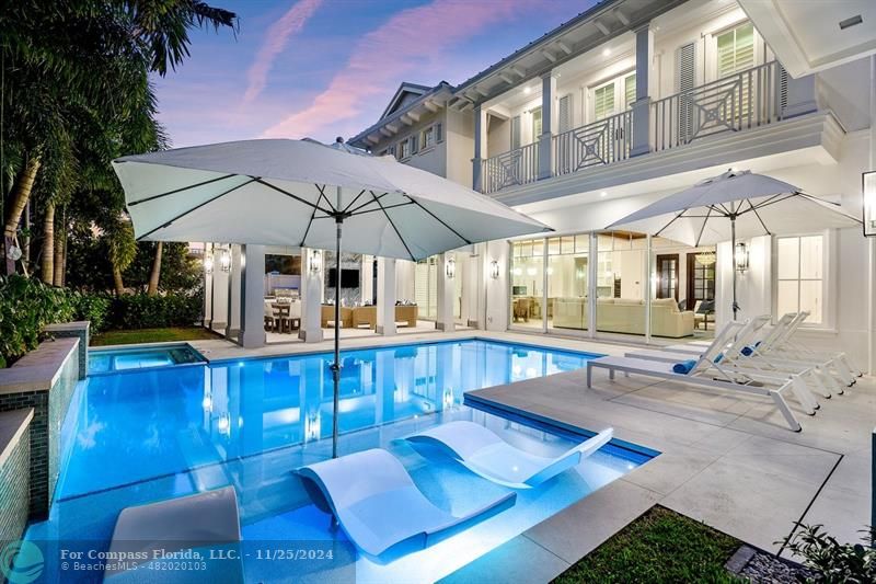 1122 Miramar Drive Delray Beach, FL 33483 - Photo 35 of 44 a view of a swimming pool with a patio