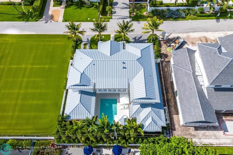 1122 Miramar Drive Delray Beach, FL 33483 - Photo 41 of 44 an aerial view of a house with a garden