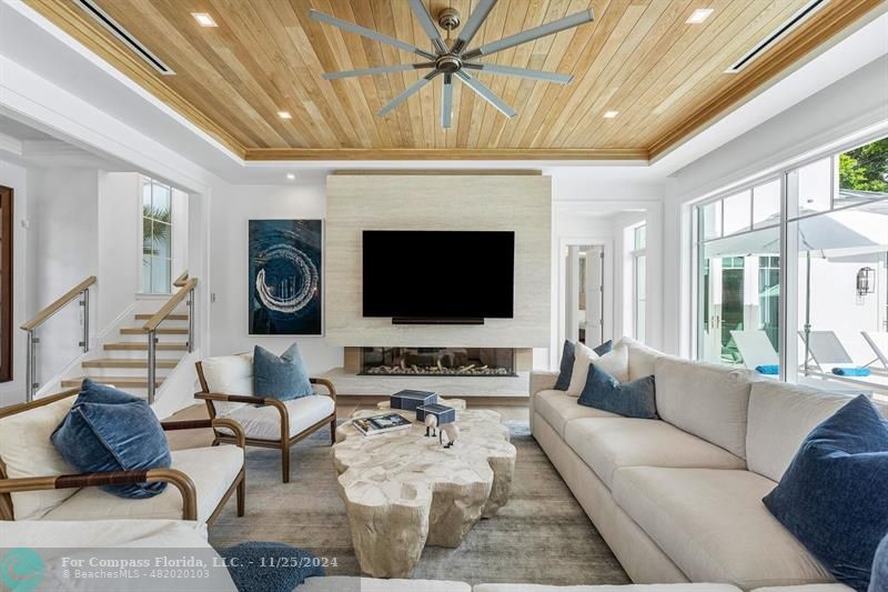 1122 Miramar Drive Delray Beach, FL 33483 - Photo 5 of 44 a living room with furniture and a flat screen tv