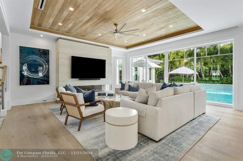 1122 Miramar Drive Delray Beach, FL 33483 - Photo 7 of 44 a living room with furniture and a flat screen tv