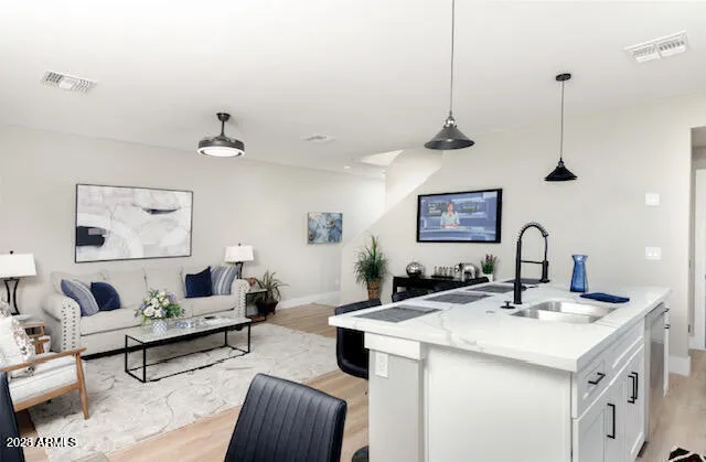 a living room with furniture and a table