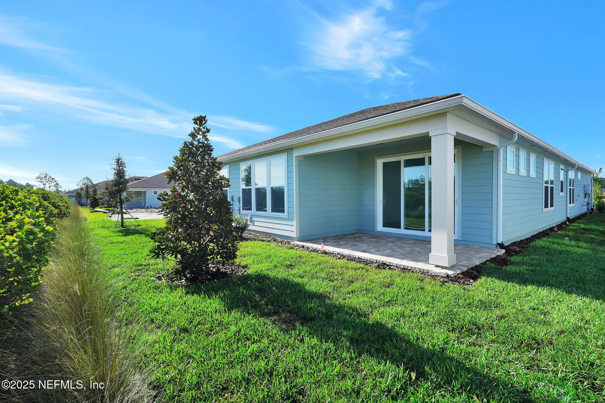 269 Ecliptic Loop Yulee, FL 32097 - Photo 22 of 44 a view of a house with a yard and plants
