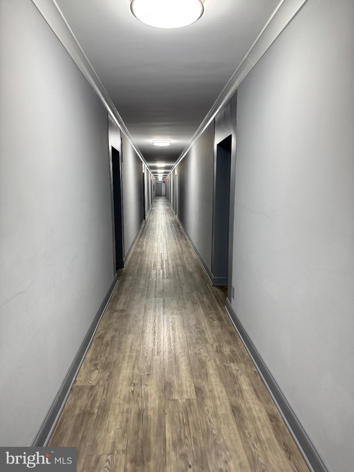 8601 Manchester Road, Unit 319 Silver Spring, MD 20901 - Photo 5 of 17 a view of gallery with wooden floor