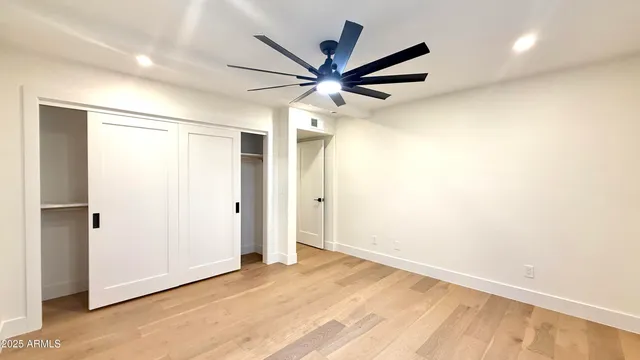 a bathroom with a double vanity sink and mirror