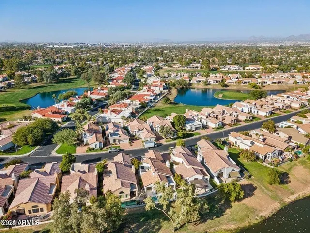 an aerial view of a house with sitting space