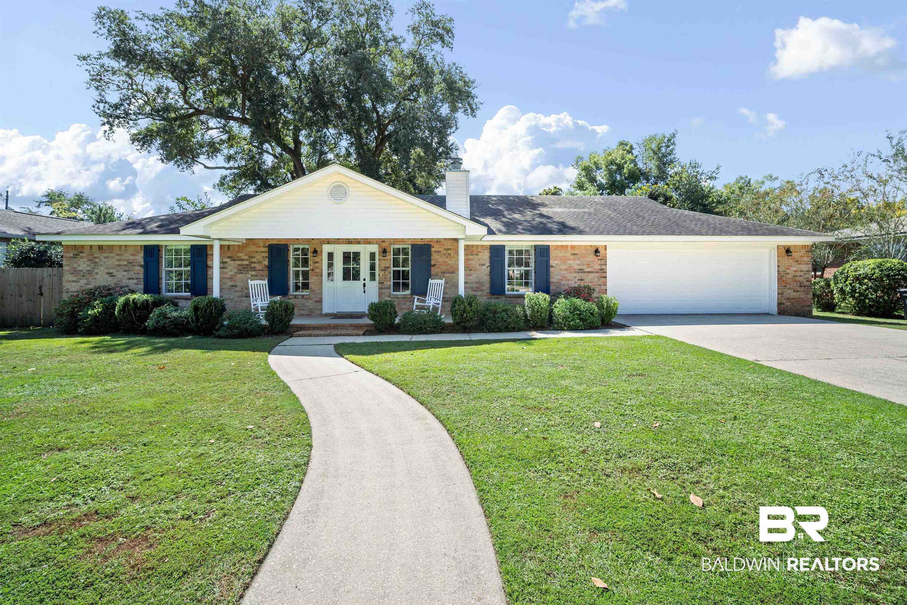 808 Michigan Avenue Fairhope, AL 36532 - Photo 1 of 33 Ranch-style home with a porch, a garage, and a front yard