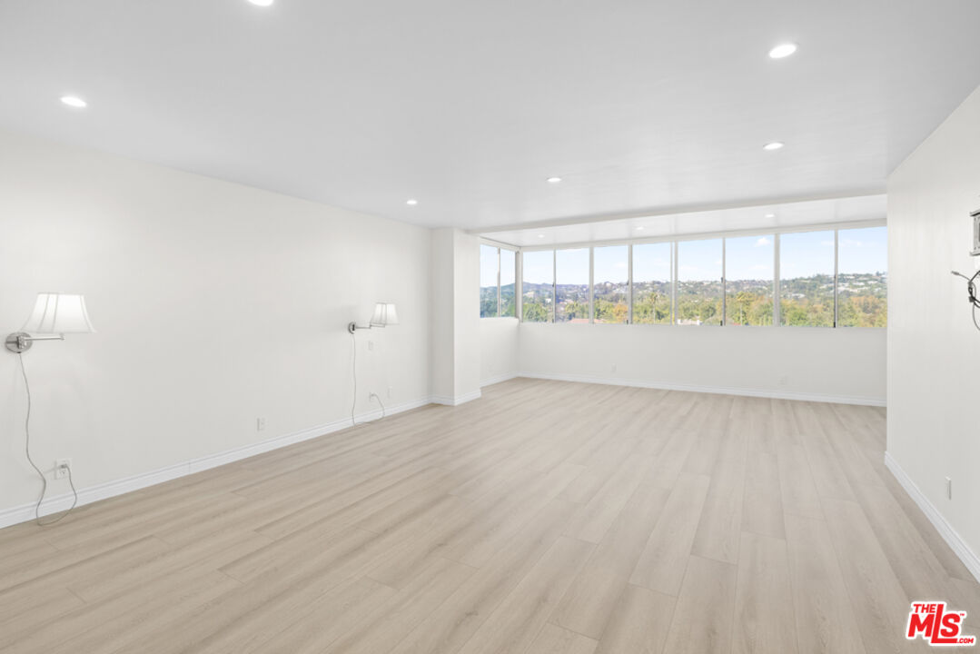 865 Comstock Avenue, Unit 10D/E Los Angeles, CA 90024 - Photo 19 of 49 a view of an empty room with a window