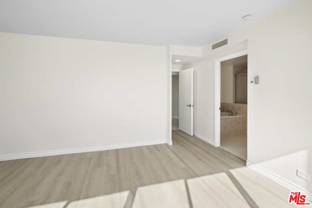 865 Comstock Avenue, Unit 10D/E Los Angeles, CA 90024 - Photo 32 of 49 wooden floor in a room