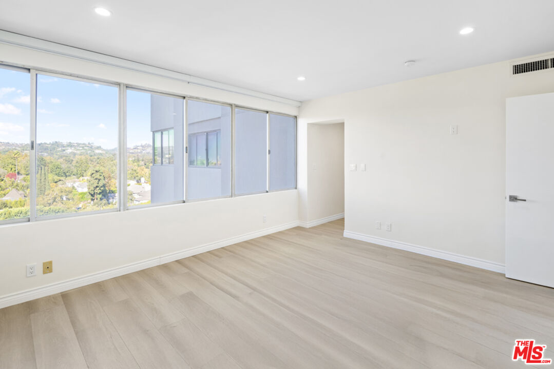 865 Comstock Avenue, Unit 10D/E Los Angeles, CA 90024 - Photo 40 of 49 a view of an empty room with a window