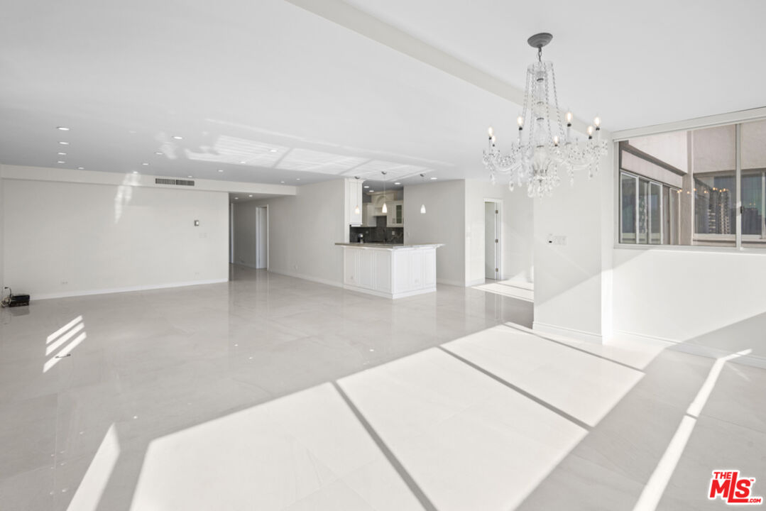 865 Comstock Avenue, Unit 10D/E Los Angeles, CA 90024 - Photo 7 of 49 a living room with a couch