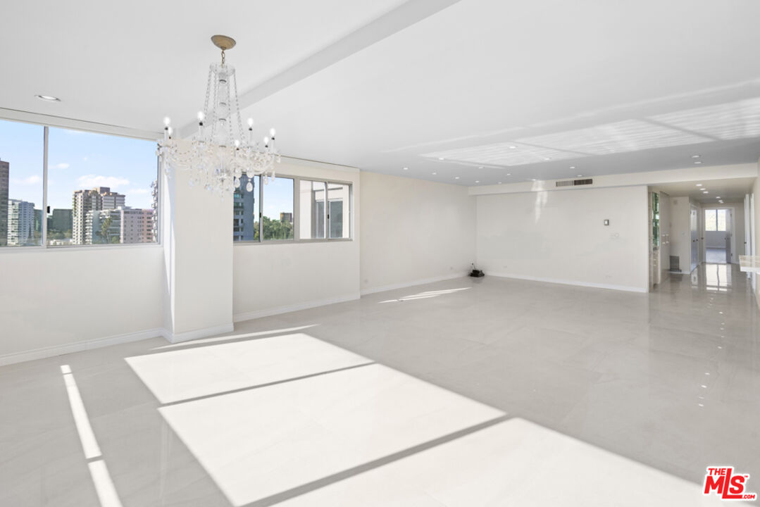 865 Comstock Avenue, Unit 10D/E Los Angeles, CA 90024 - Photo 8 of 49 a view of an empty room with a window