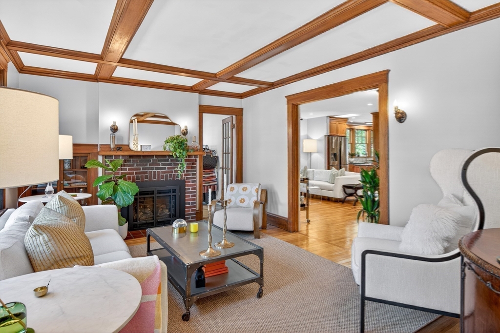 76-78 Lewis Road Belmont, MA 02478 - Photo 17 of 36 a living room with furniture and a fireplace