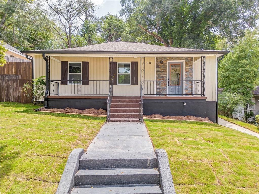 a front view of a house with swimming pool
