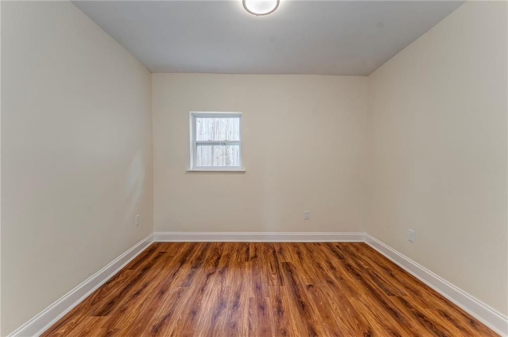 310 Kingston Avenue Northeast Rome, GA 30161 - Photo 15 of 45 a view of a room with wooden floor and window