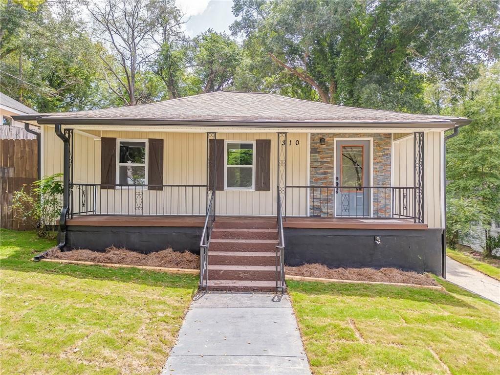 310 Kingston Avenue Northeast Rome, GA 30161 - Photo 2 of 45 a view of a house with a swimming pool