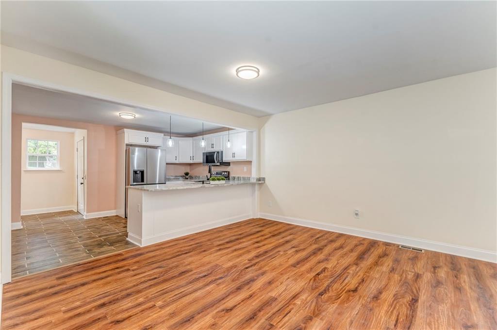 310 Kingston Avenue Northeast Rome, GA 30161 - Photo 23 of 45 a view of kitchen with wooden floor