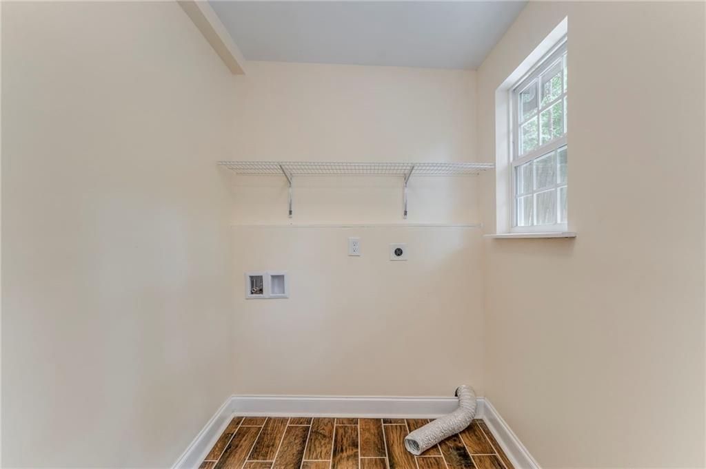 310 Kingston Avenue Northeast Rome, GA 30161 - Photo 32 of 45 a view of a door and a window in an empty room