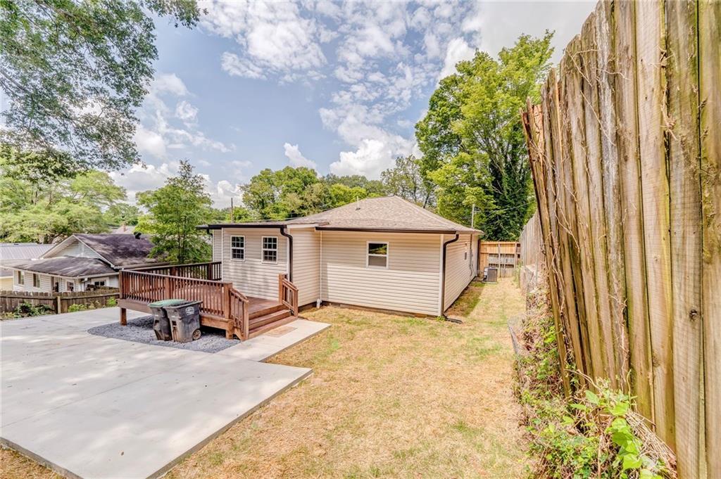 310 Kingston Avenue Northeast Rome, GA 30161 - Photo 41 of 45 a view of a house with backyard and sitting area