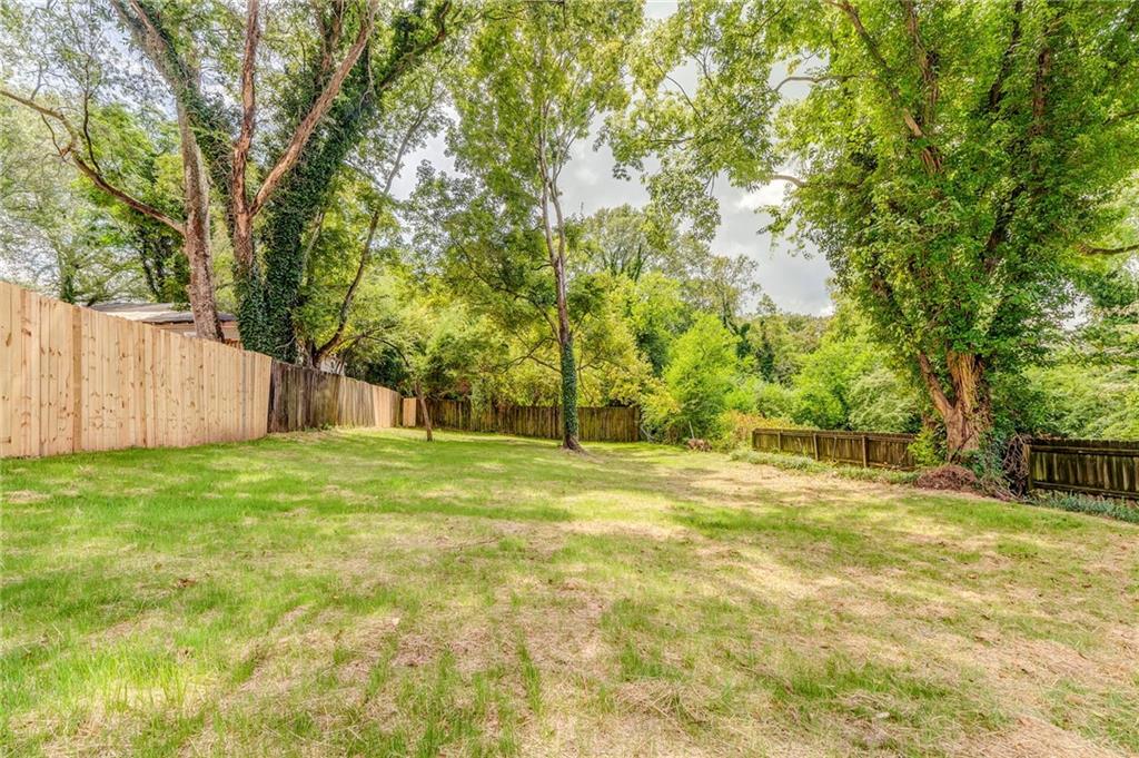 310 Kingston Avenue Northeast Rome, GA 30161 - Photo 42 of 45 a view of a yard with a trees