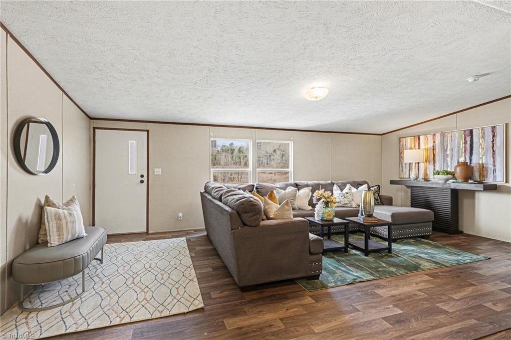 5061 Reid Road Winston-Salem, NC 27107 - Photo 2 of 39 Foyer area and front living room is large enough for a sectional sofa.