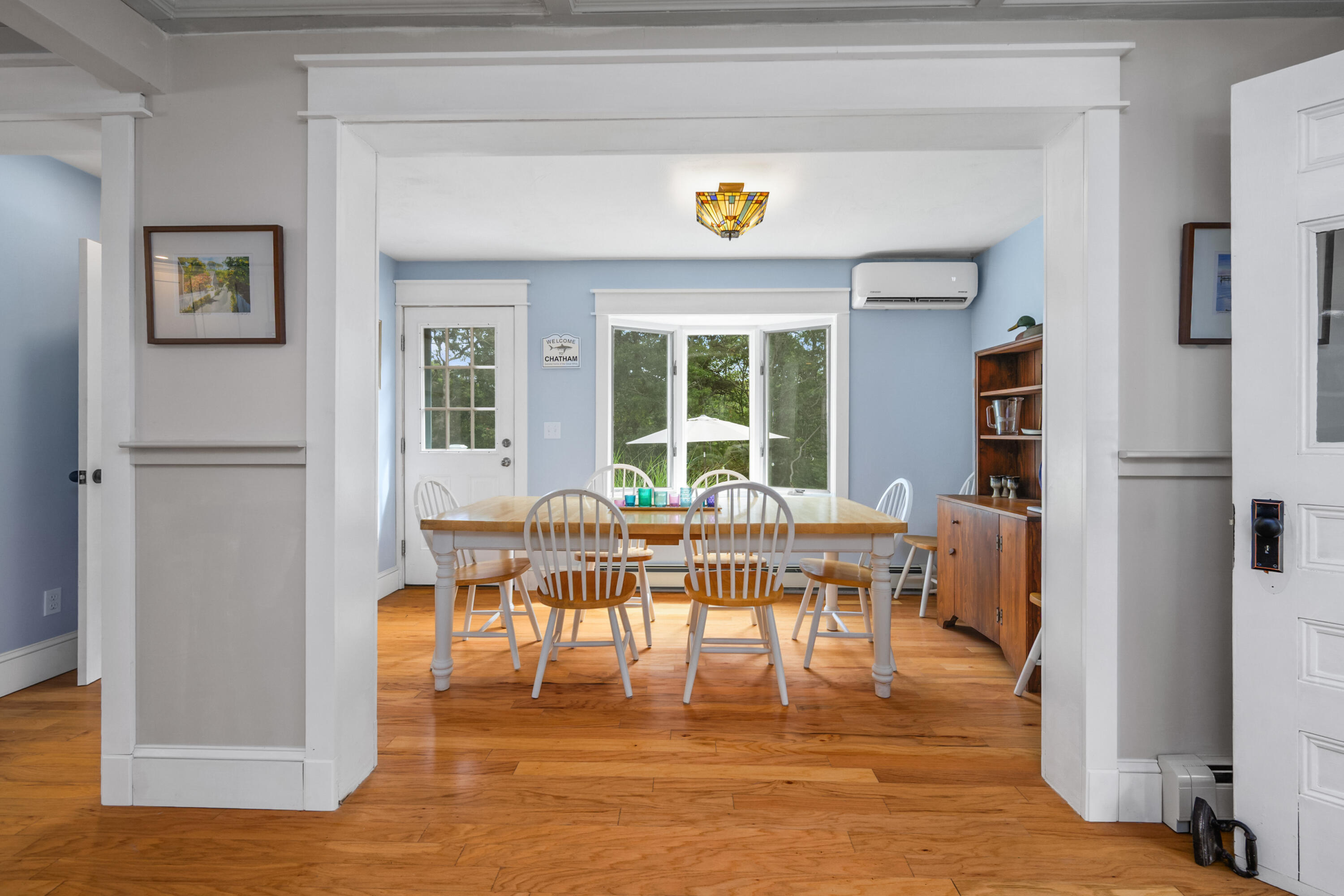 79 Forest Beach Road South Chatham, MA 02659 - Photo 12 of 60 a view of a dining room with furniture and a window