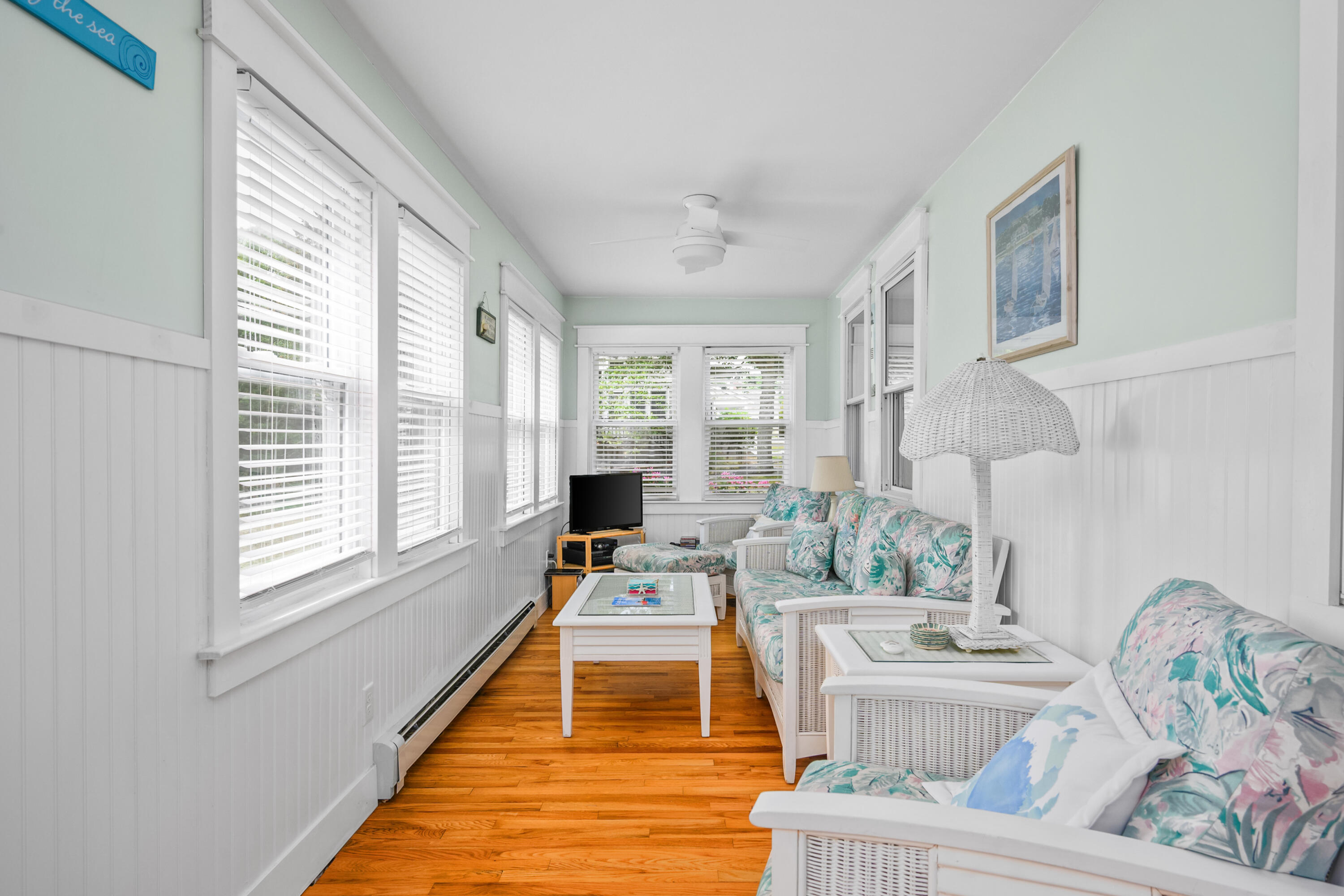 79 Forest Beach Road South Chatham, MA 02659 - Photo 17 of 60 a living room with furniture and a table