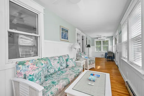 a kitchen with stainless steel appliances granite countertop a sink window and refrigerator