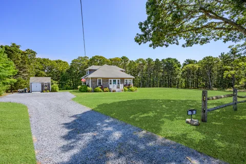 a view of an chairs and tables in the patio