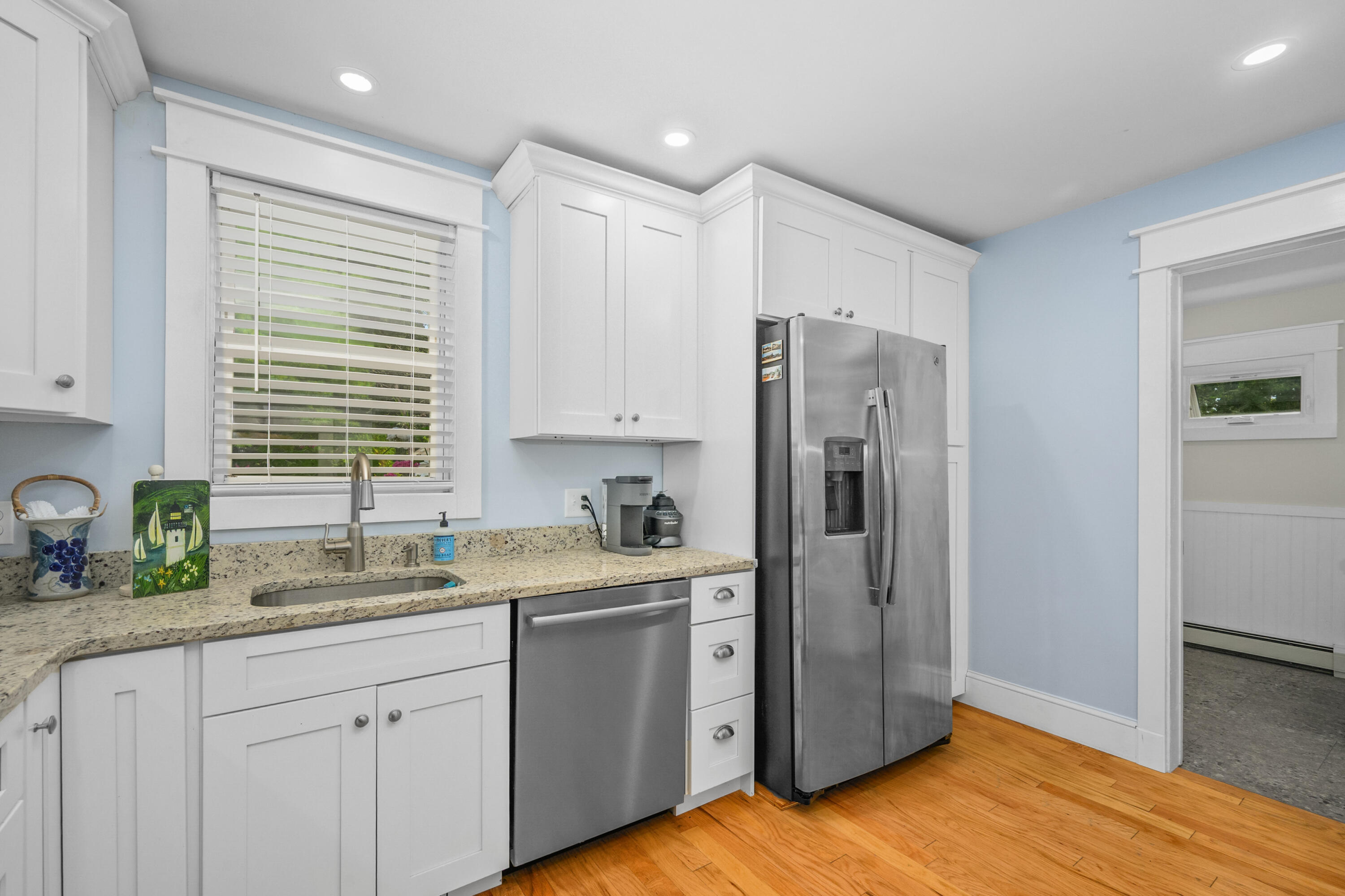 79 Forest Beach Road South Chatham, MA 02659 - Photo 21 of 60 a kitchen with a sink cabinets stainless steel appliances and a window