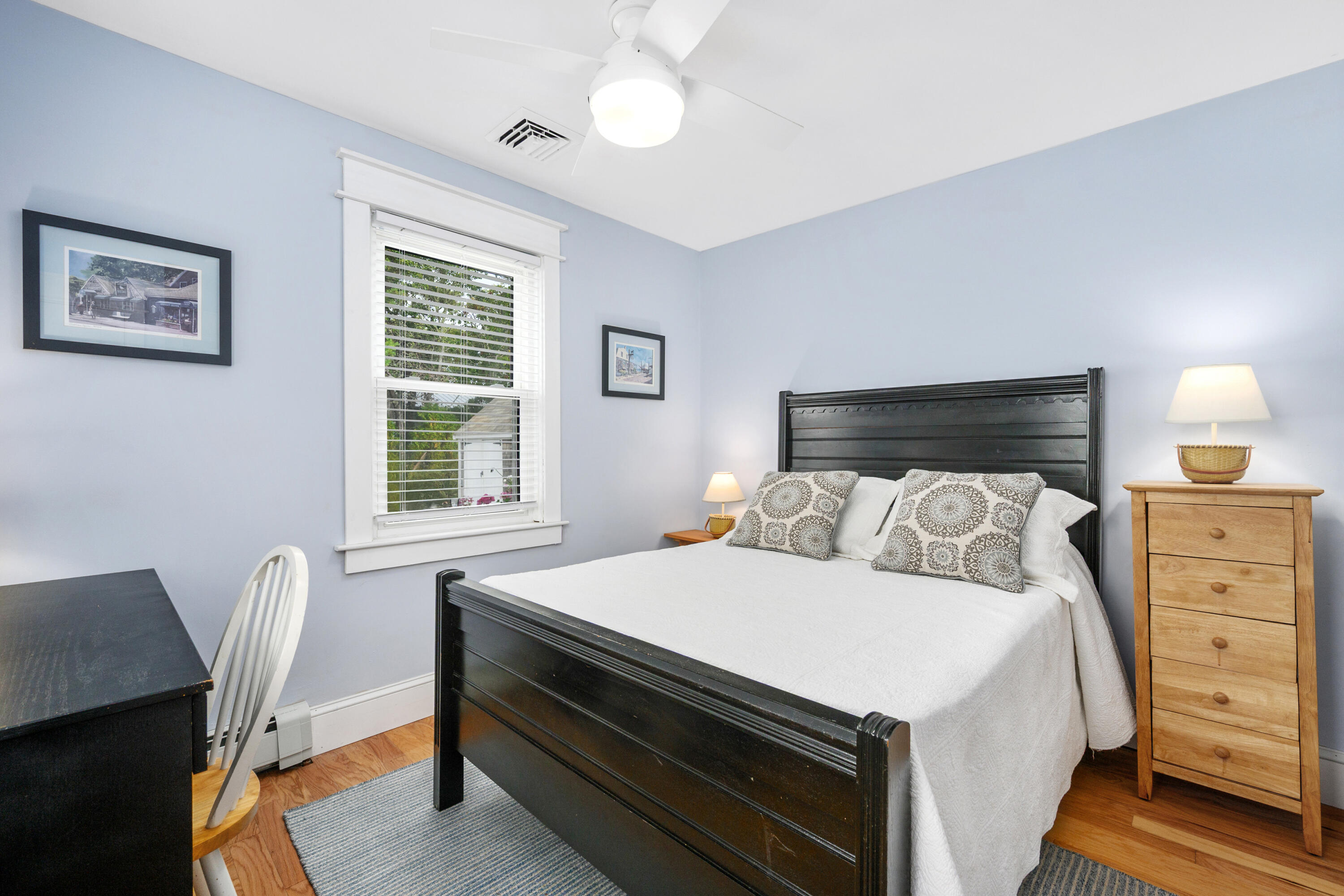 79 Forest Beach Road South Chatham, MA 02659 - Photo 22 of 60 a bed room with a bed and a chair