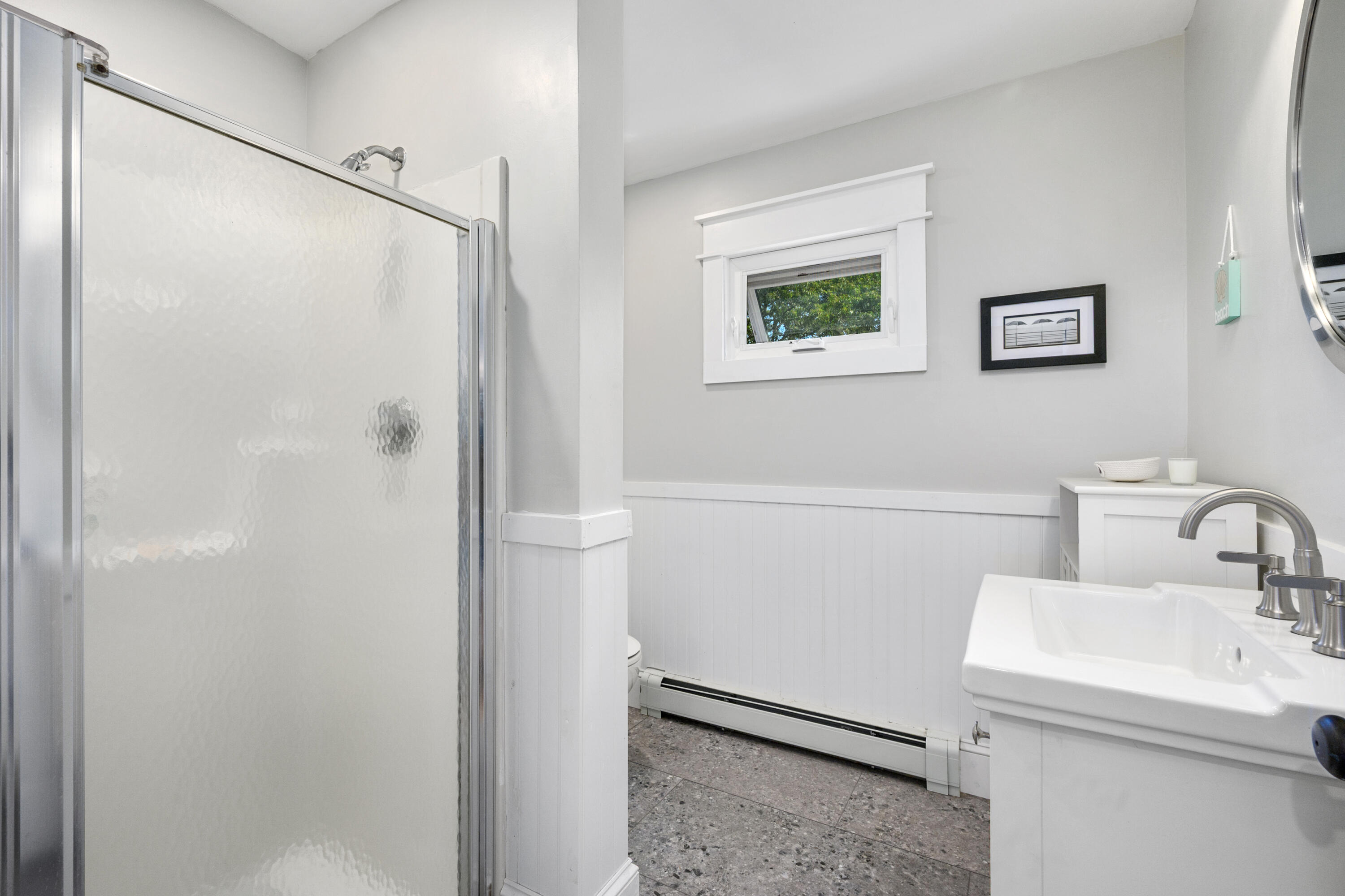 79 Forest Beach Road South Chatham, MA 02659 - Photo 24 of 60 a bathroom with a sink and a toilet