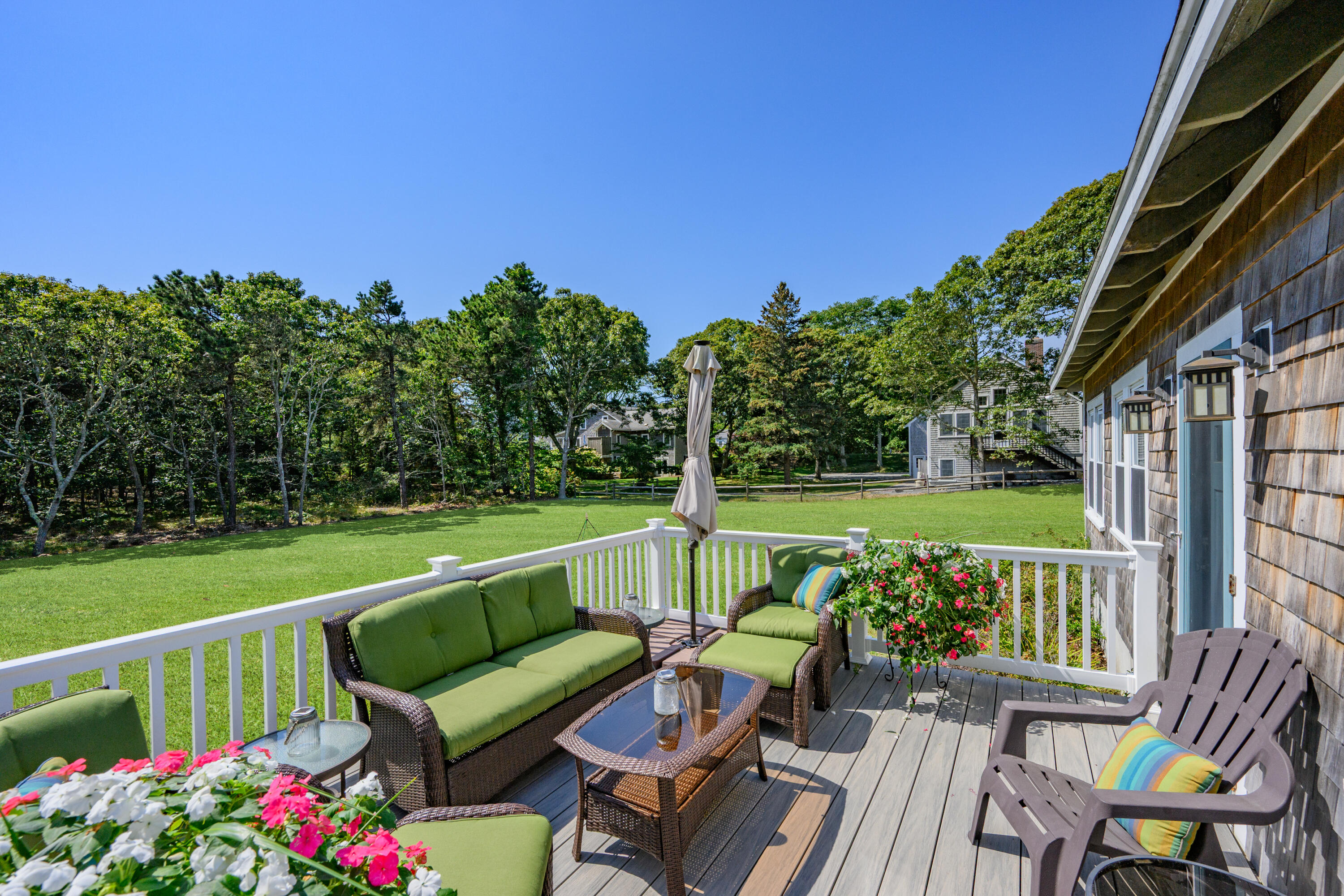 79 Forest Beach Road South Chatham, MA 02659 - Photo 3 of 60 a view of an chairs and tables in the patio
