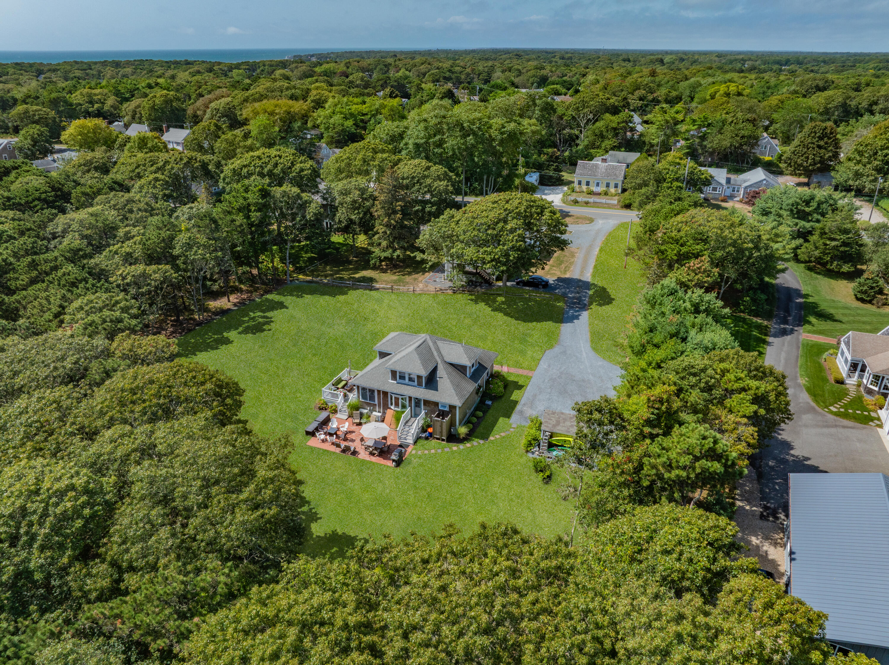 79 Forest Beach Road South Chatham, MA 02659 - Photo 54 of 60 an aerial view of a house with a yard