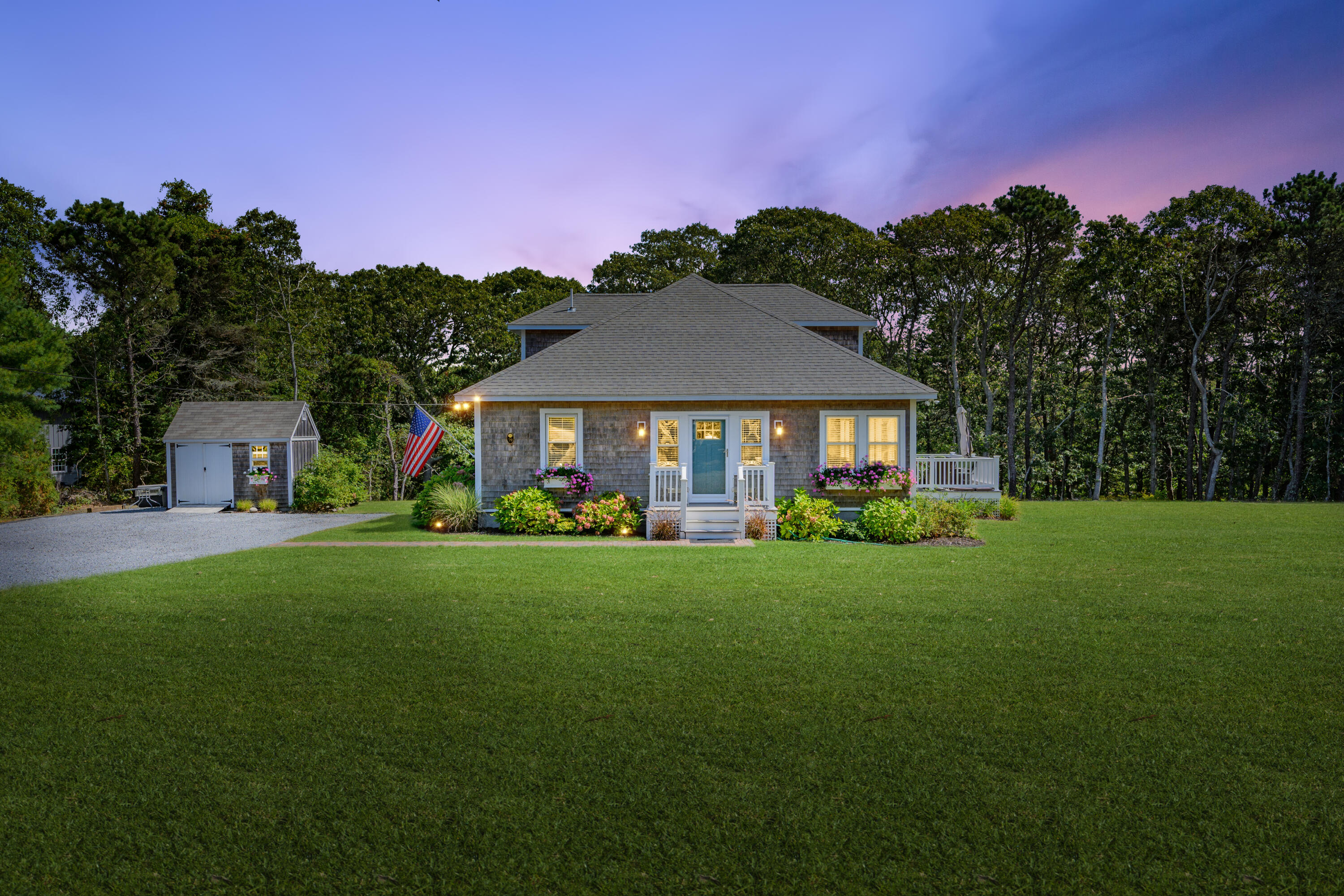 79 Forest Beach Road South Chatham, MA 02659 - Photo 60 of 60 a front view of a house with garden