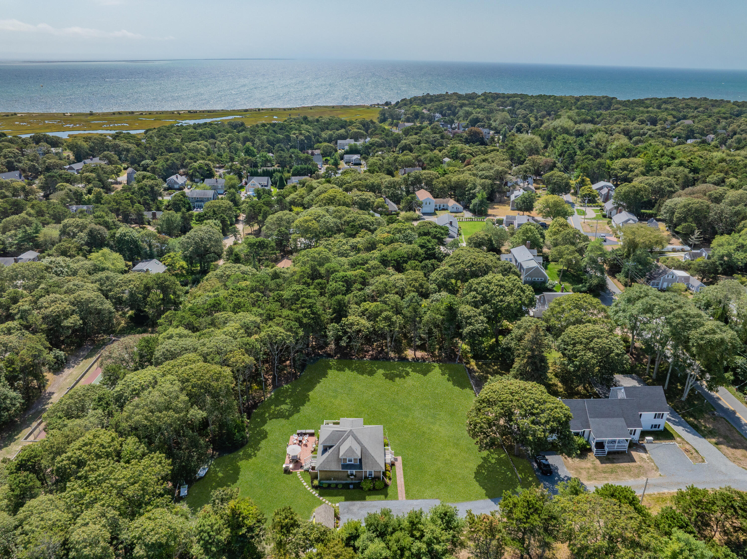 79 Forest Beach Road South Chatham, MA 02659 - Photo 6 of 60 an aerial view of a house with a yard