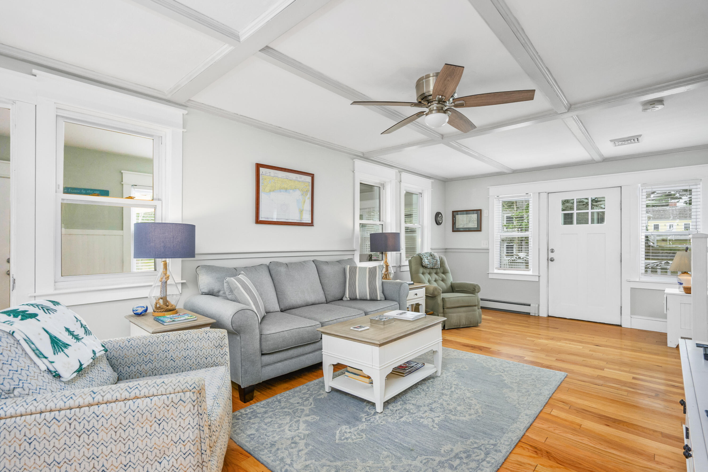 79 Forest Beach Road South Chatham, MA 02659 - Photo 9 of 60 a living room with furniture and a wooden floor