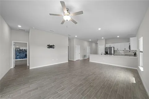 a kitchen with appliances cabinets and a counter top space