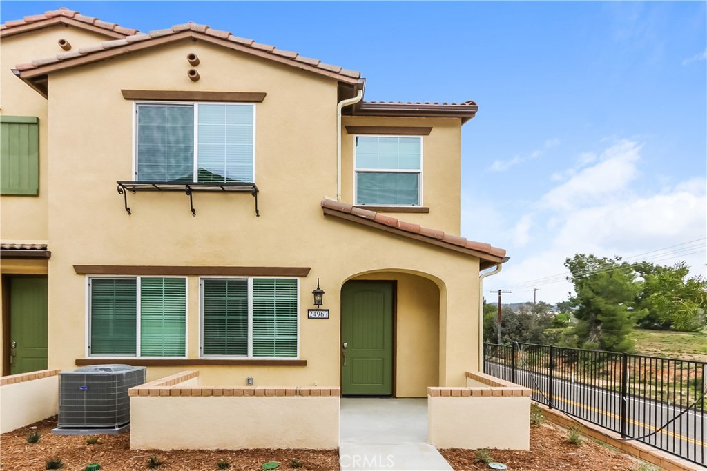 24967 Padre Court Wildomar, CA 92595 - Photo 1 of 30 a front view of a house with a yard