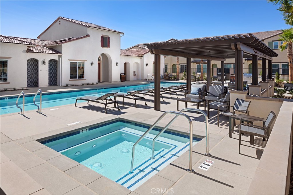 24967 Padre Court Wildomar, CA 92595 - Photo 20 of 30 a view of a patio with table and chairs with wooden floor and fence