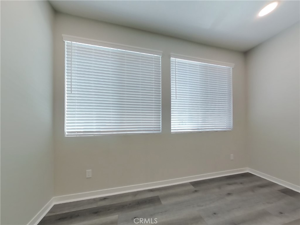24967 Padre Court Wildomar, CA 92595 - Photo 2 of 30 an empty room with a window