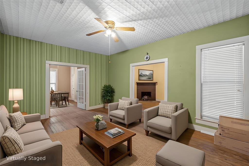 2623 North 15th A Street Waco, TX 76708 - Photo 9 of 23 a living room with furniture and a large window