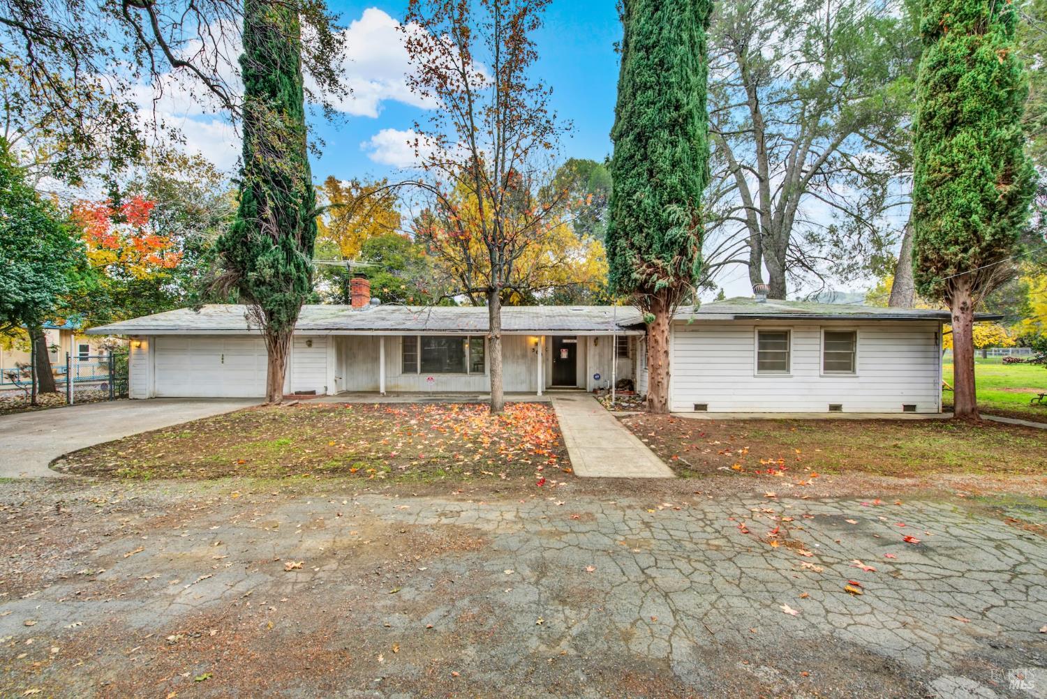 300 Butcher Road Vacaville, CA 95687 - Photo 1 of 1 a view of a house with a yard and large tree
