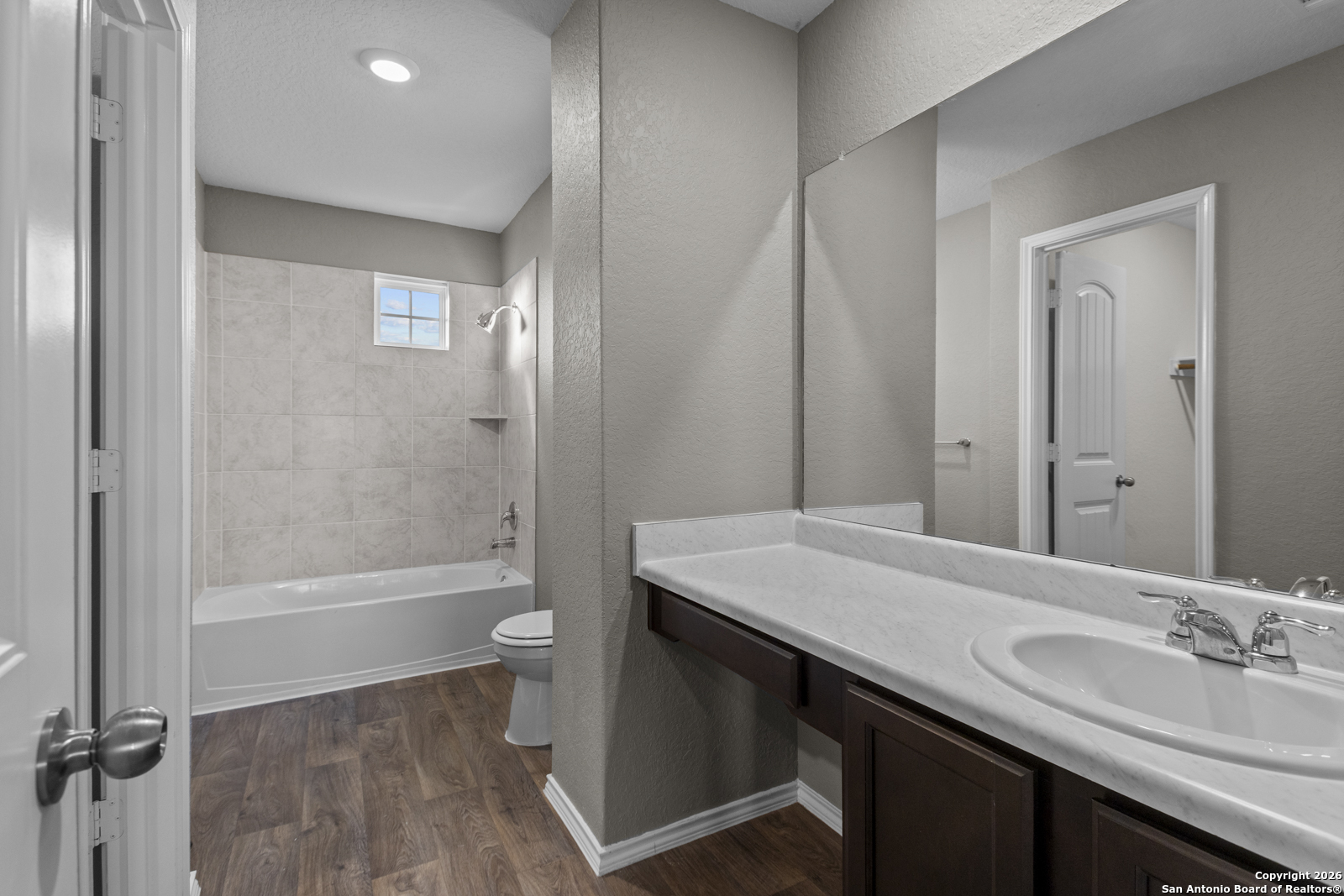 4106 Winterfell Pass Converse, TX 78109 - Photo 18 of 31 a bathroom with a sink a toilet and shower