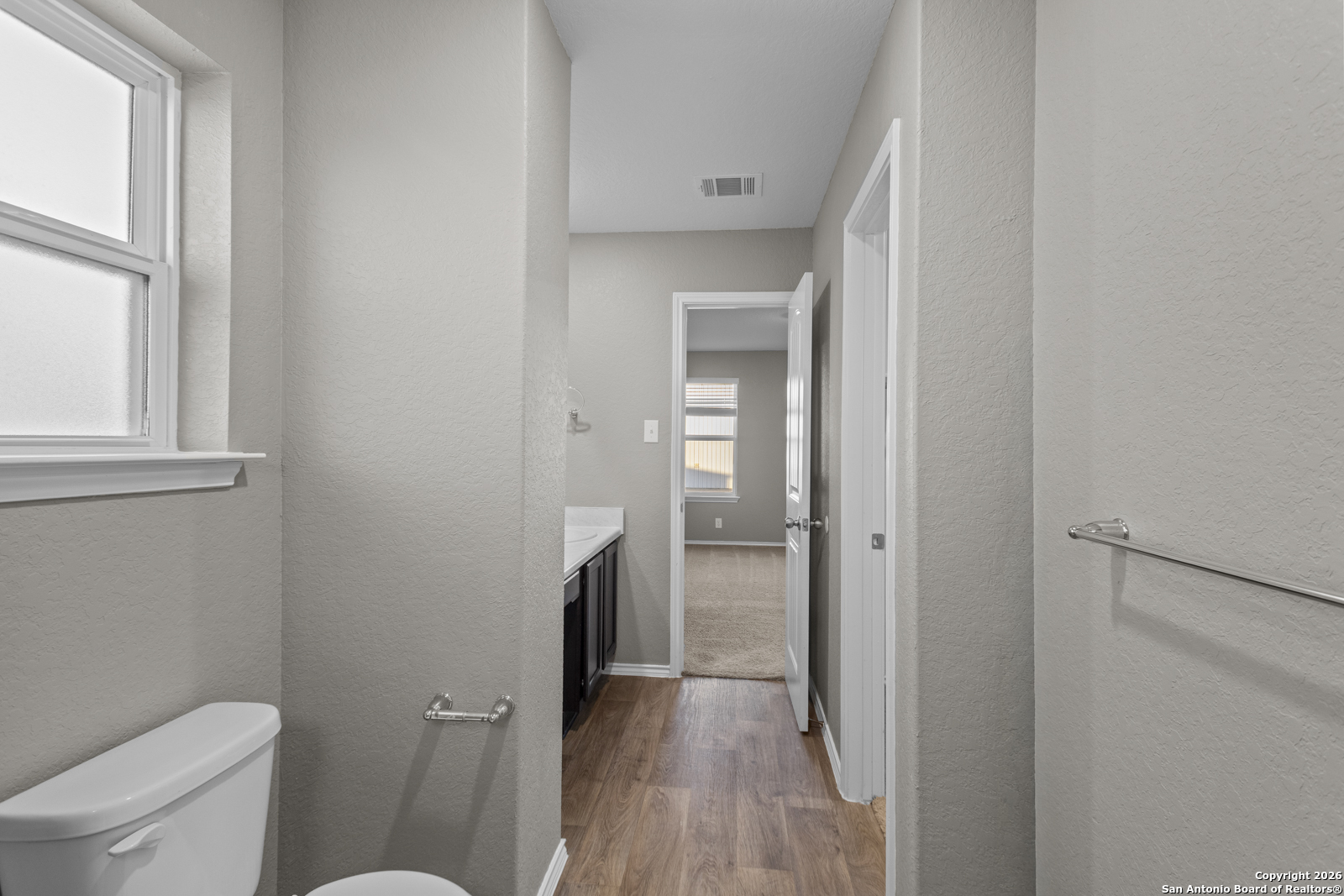 4106 Winterfell Pass Converse, TX 78109 - Photo 20 of 31 a bathroom with a toilet and a shower