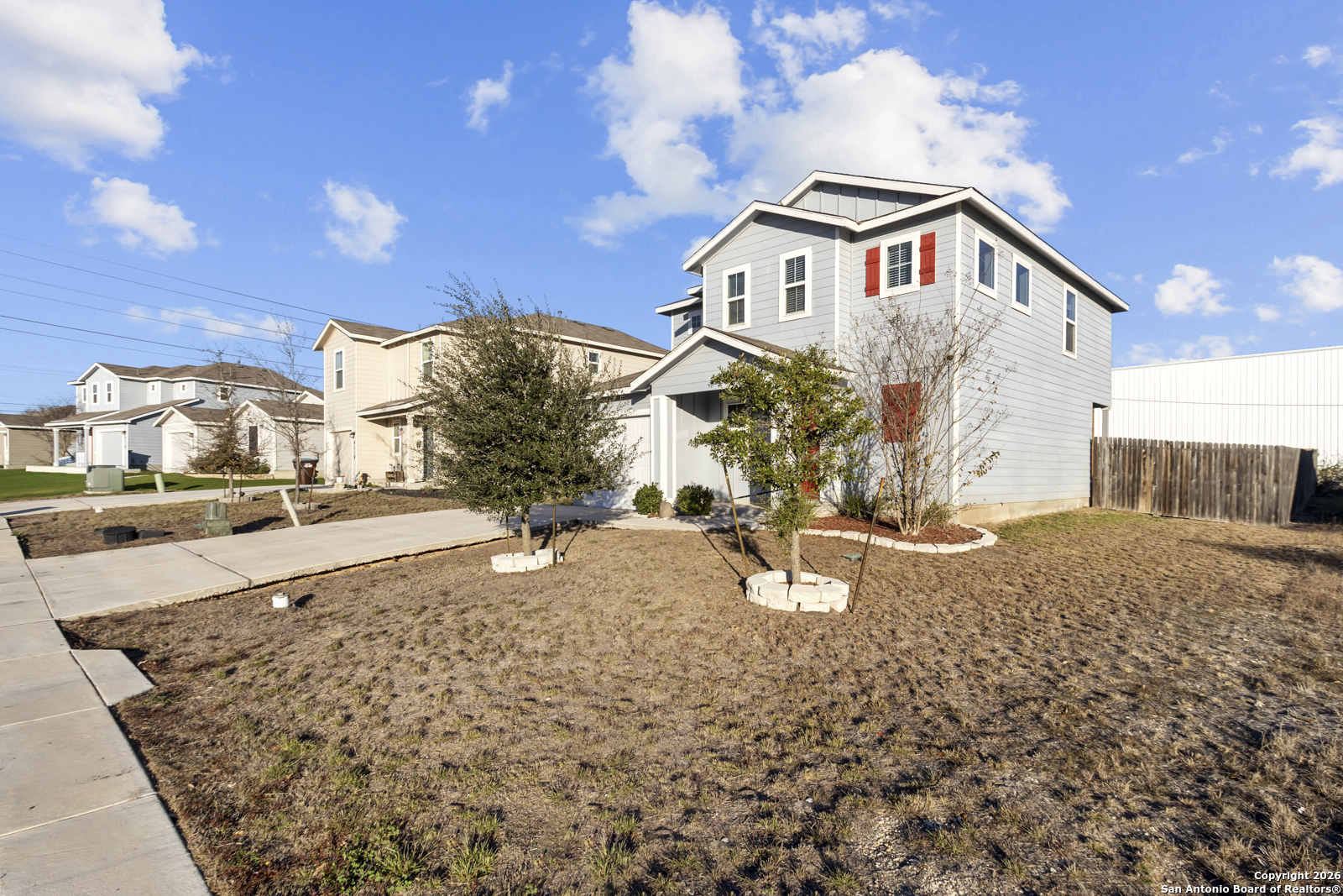 4106 Winterfell Pass Converse, TX 78109 - Photo 2 of 31 a view of a house with a yard covered in snow