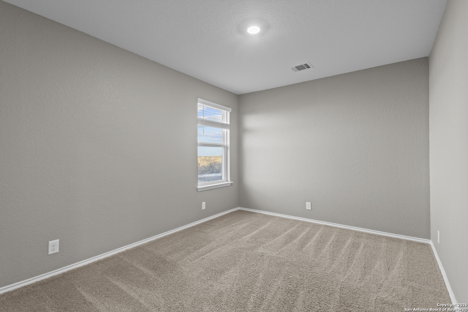 4106 Winterfell Pass Converse, TX 78109 - Photo 25 of 31 a view of an empty room with a window