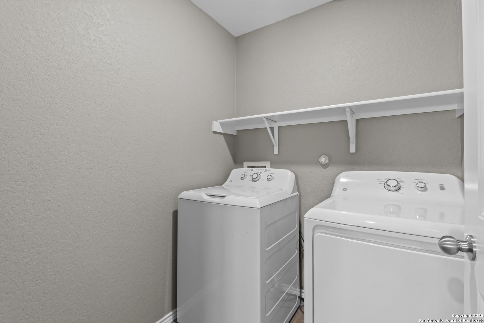 4106 Winterfell Pass Converse, TX 78109 - Photo 28 of 31 a utility room with dryer and washer