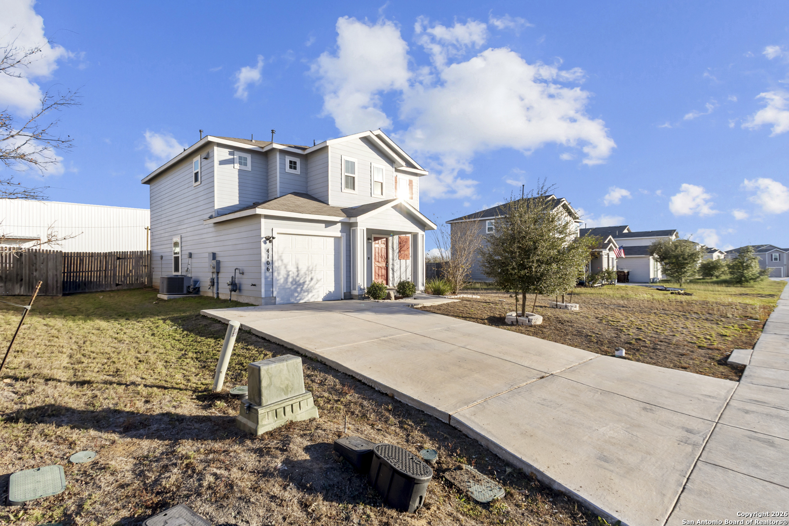 4106 Winterfell Pass Converse, TX 78109 - Photo 3 of 31 a front view of a house with a yard