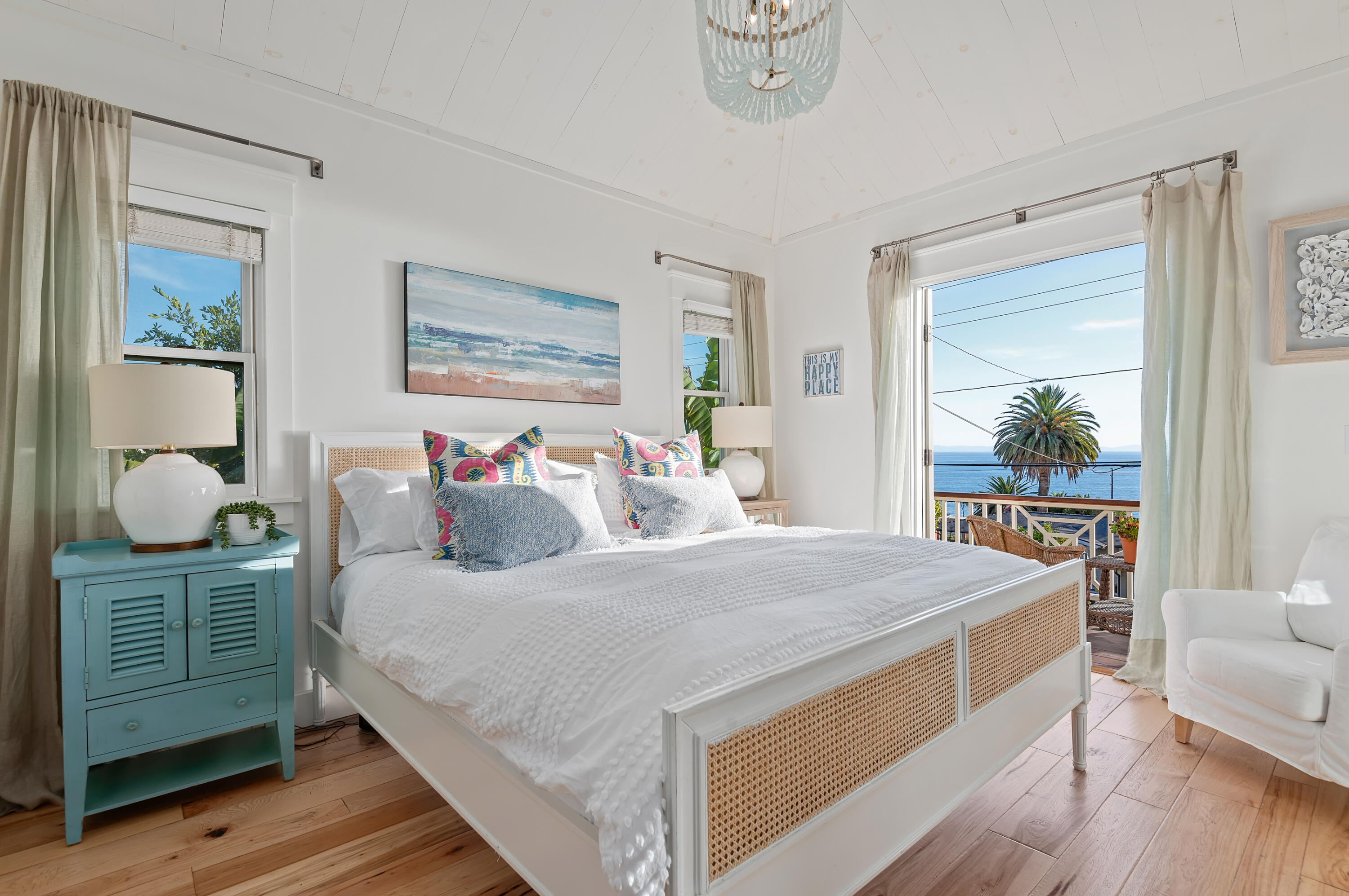 Undisclosed Address Summerland, CA 93067 - Photo 15 of 27 a bedroom with a bed and a large window